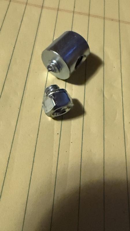 Part K adjusting bolt cracked while attempting to loosen it.