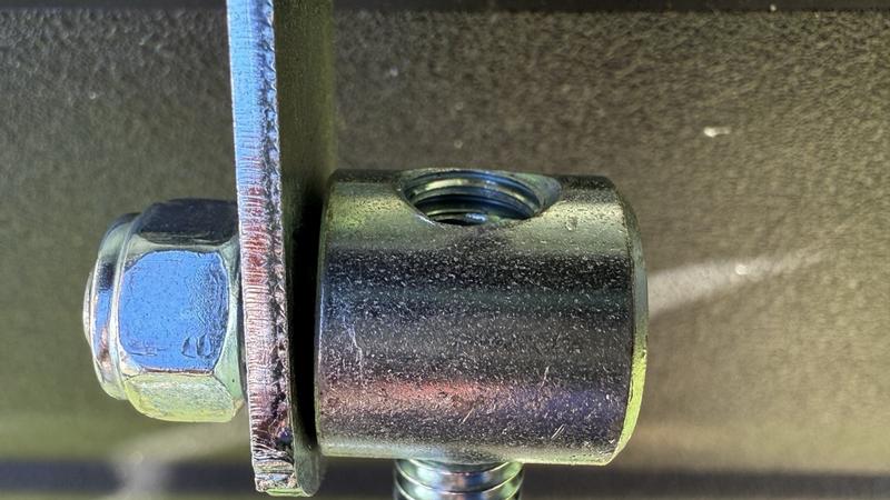 part K used to adjust y rod attached between plate and handle. at end of rod allows unit to be fully closed but not fully open