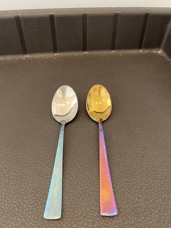 older spoon on left