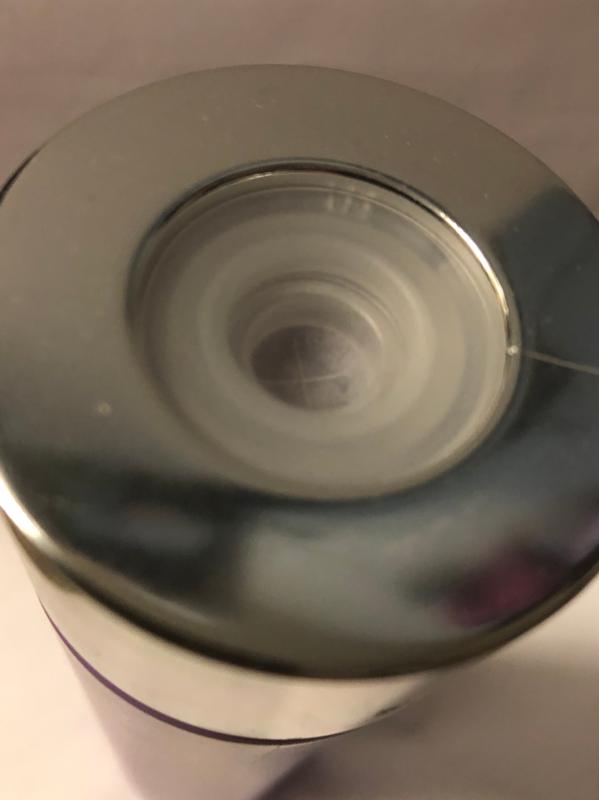 Built-in dispensing lid of view looking down top of bottle