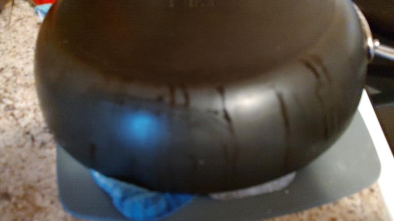 How do I get the grease marks of pan side?