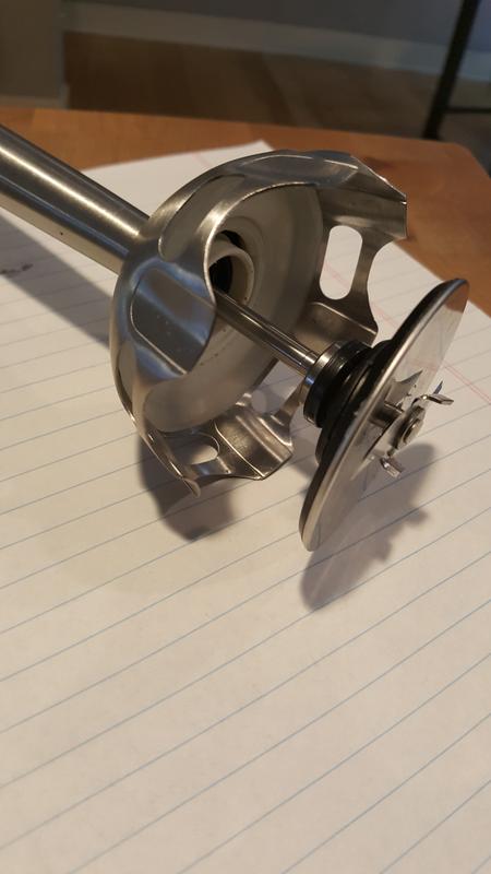 Center blade part popped out when dropped from waist height onto wood floor; cannot be put back together.