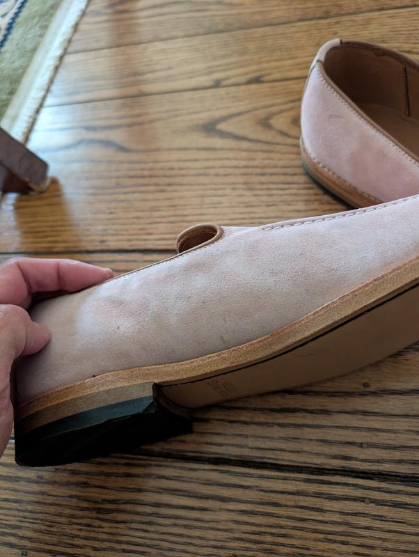 Customer photo for "Warped and stained on arrival"