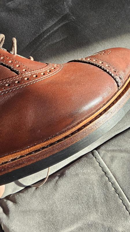 Customer photo for "Excellent looks. Not the best shape for my foot."