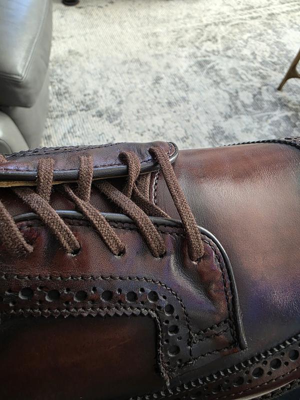 weird bubble up on one shoe lace and not matching other shoe