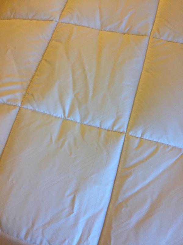 Up close view of mattress pad.