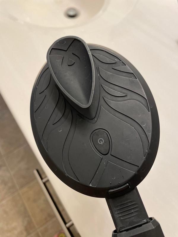 Handle on back of scrubber