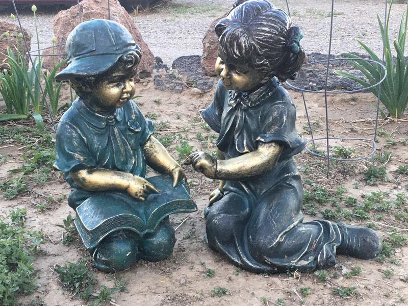 Alpine Boy and Girl Reading Together Statue