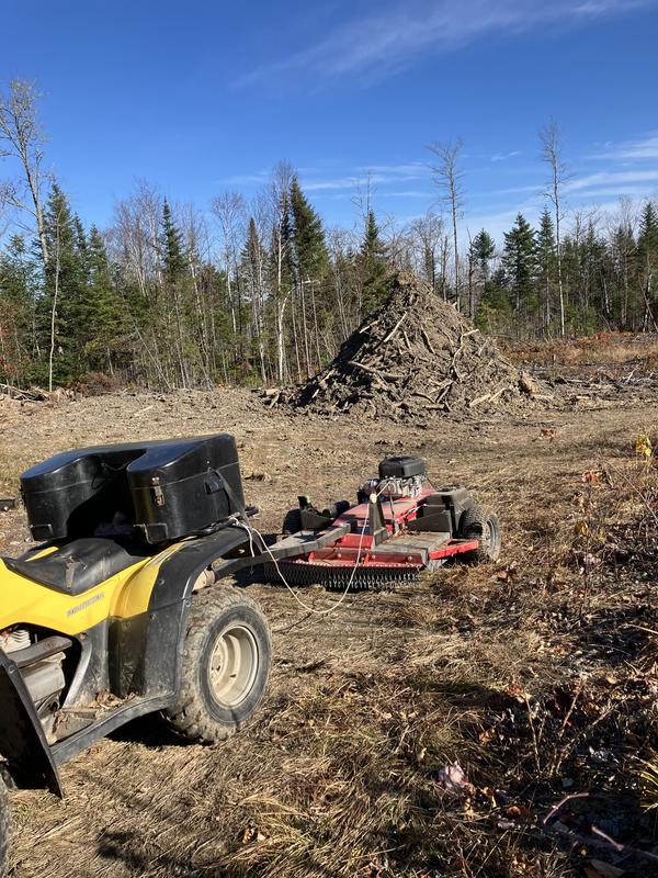 Earthquake trail mower in a rare level spot near Beaverlodge