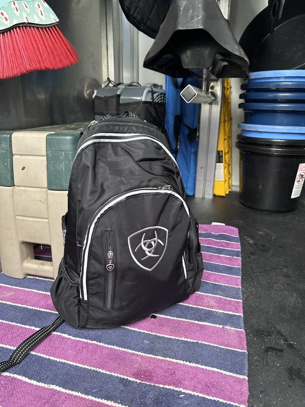 ariat leather backpack Stride Dark Navy It has adjustable straps with a leather loop on the top Ariat Ring Backpack