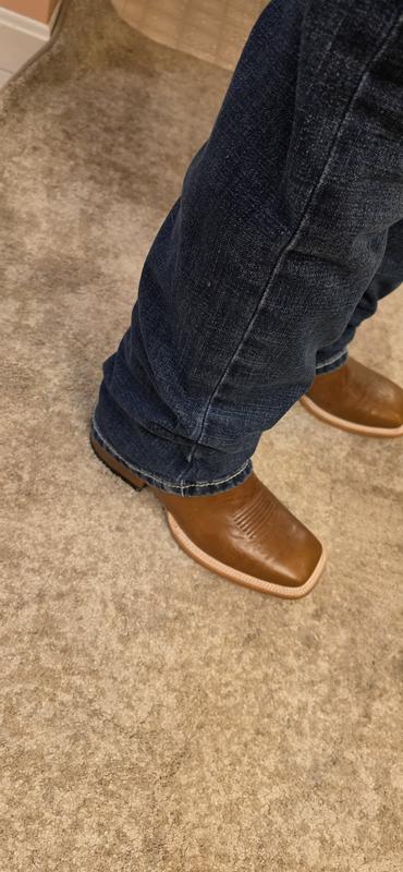 Jeans fit and tuck over my boots