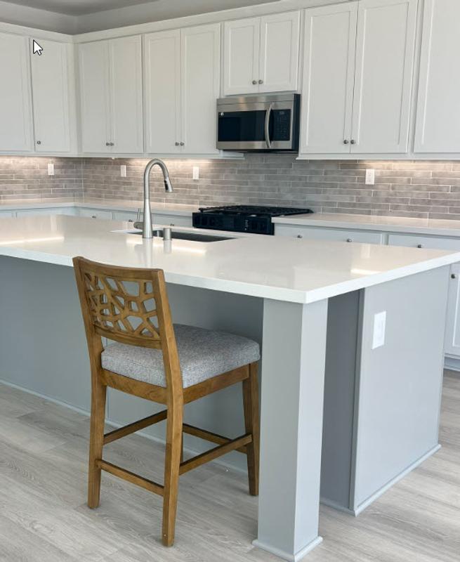 Love these stools for adding needed warmth and designer detail to my white and grey kitchen :)