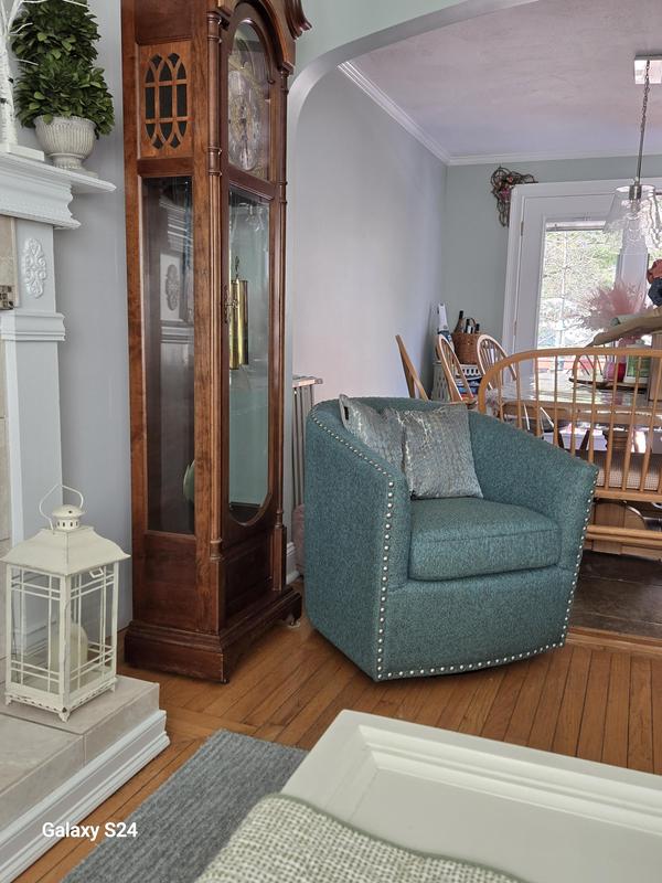 Love, love, love the swivel chair.  The color goes so well with my sofa, carpet and paint.  Perfect