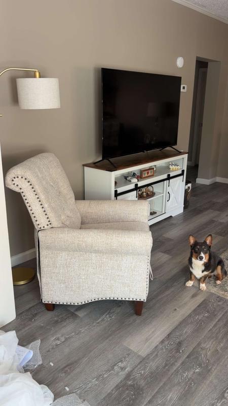 Perfect little chair for this corner! I am 5”5 and I fit in comfortably, but chair is a-little stiff