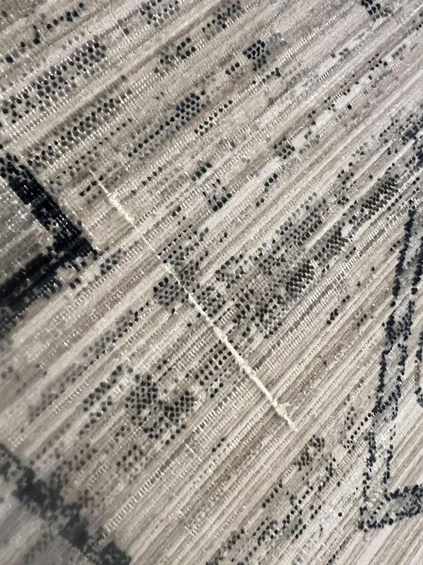 Random “off” stitch in the middle of the rug.