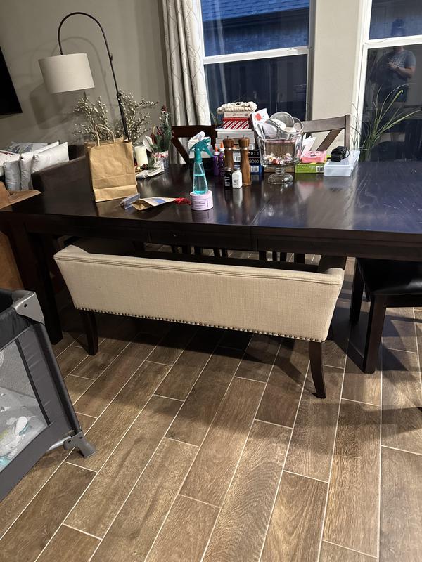 about an inch short so i got some furniture risers. i like it a lot more than our previous one.