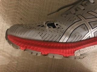 Hole in mesh, significant wear on fabric underneath after just 70 miles.