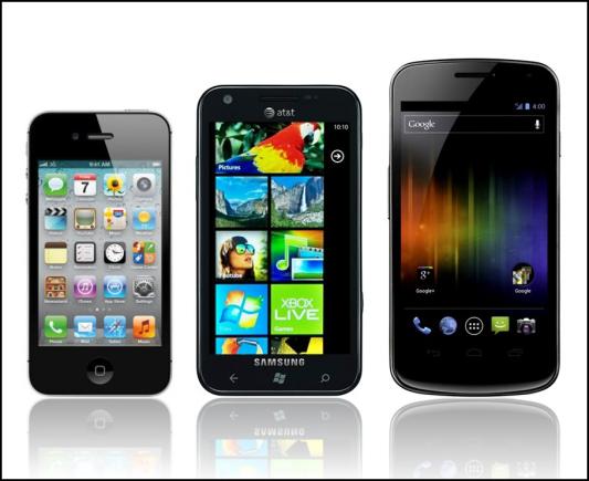 Iphone 4S and Galaxy Nexus next to the Samsung Focus S.