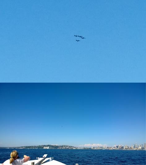 Wow, just wow. See the little black dot just off-centered to the left? Yeah, that's the planes that are in the top image. This image has had not post-porccessing.