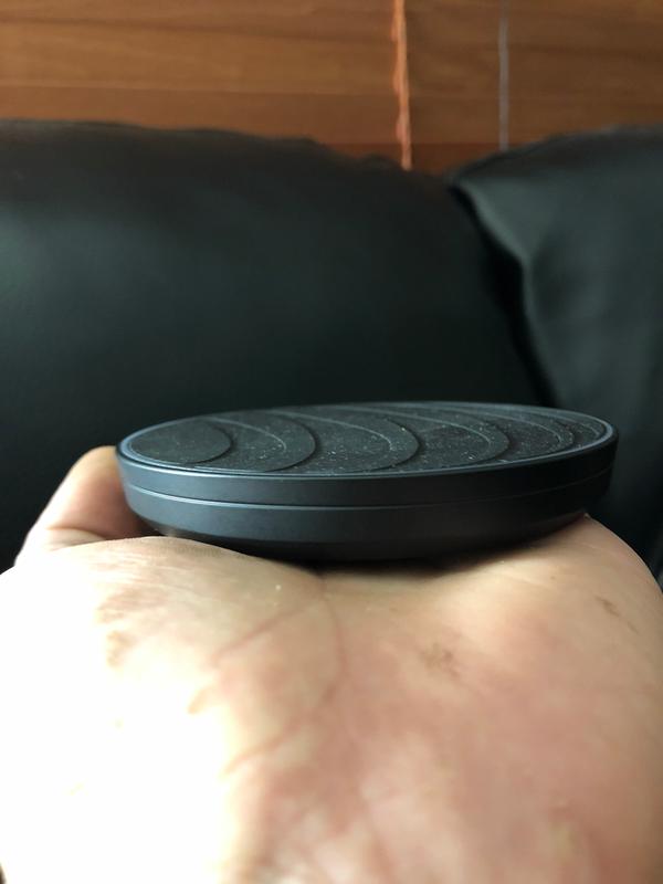 Weighted base keep charger from moving