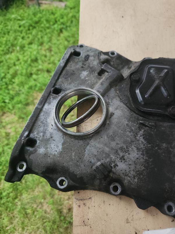 Old Oil Seal has rubber and metal.  No replacement in pack.  Bag had smaller ones.