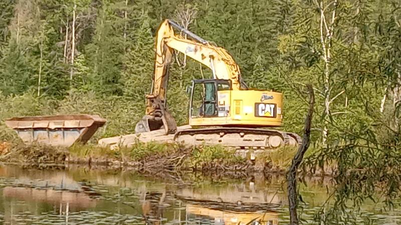 building a spillway and shoring up a dam