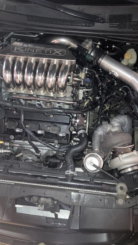 Catch can installed on Camaro SBC.