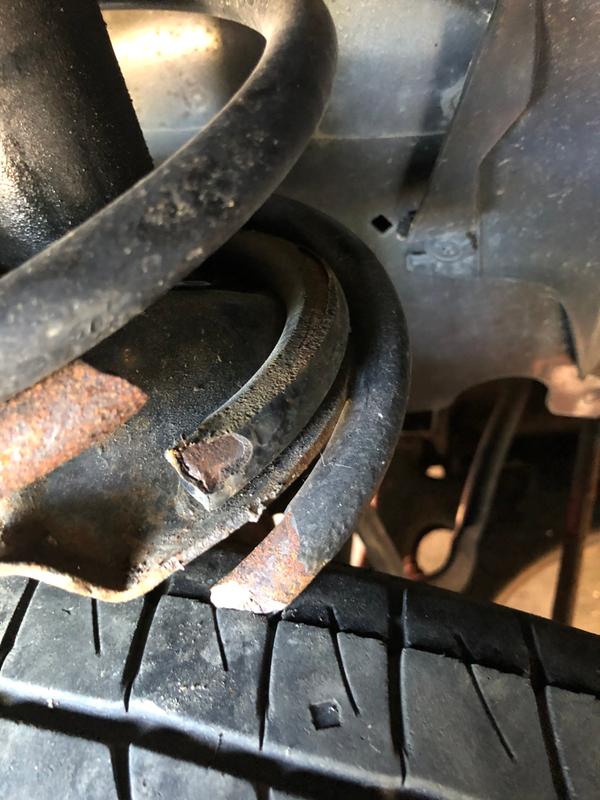 This is what my spring looked like when it broke.  I needed a new loaded strut assembly.