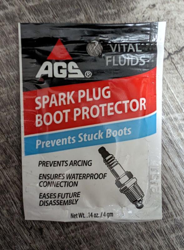 Spark plug greeze