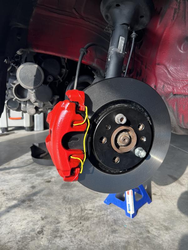 Front brake, calipers and rear differential bolts in red VHT paint.