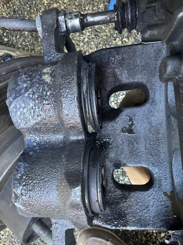 Passenger side caliper