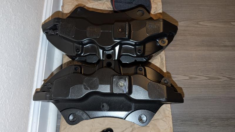 These calipers were sprayed roughly 8 years ago and still look decent.
