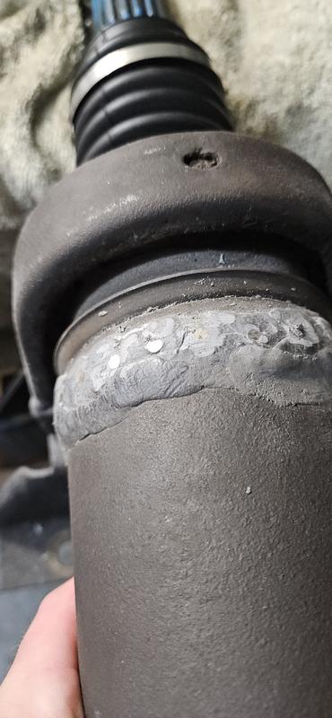 Broken column with a curtain rod inserted for support