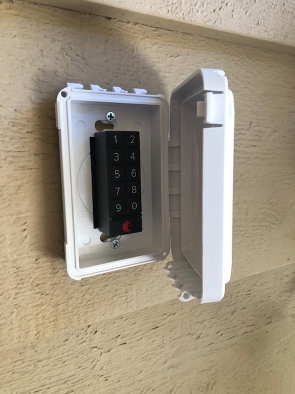 Keypad hidden/protected inside a slim, one-gang electrical cover box