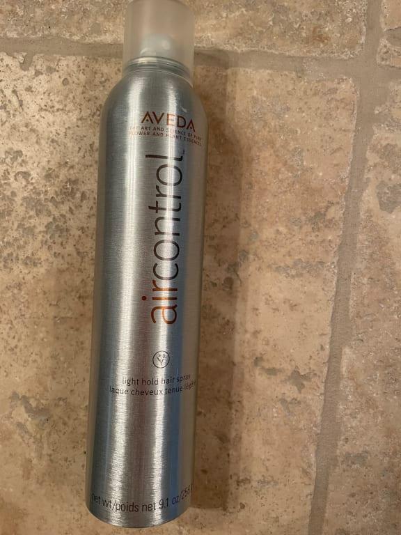 Customer photo for "My favorite hairspray, but the bottle is defective!"