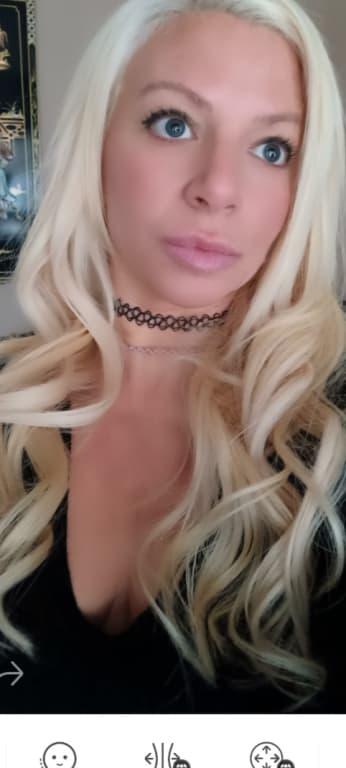 Customer photo for "My bleached hair with extensions love this product!"