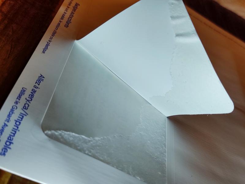 Glue backing peels with the label