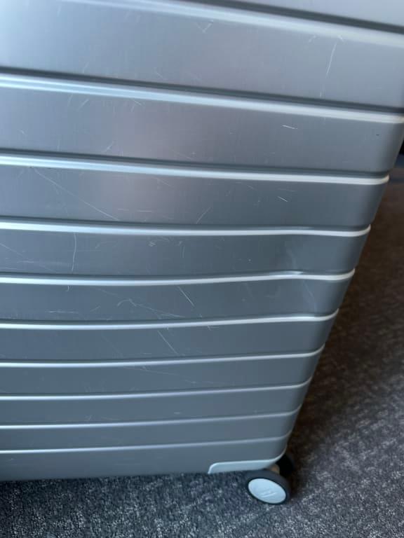 The Large Aluminum Suitcase in Silver Away