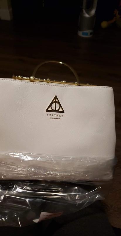 Deathly hallows white discount purse