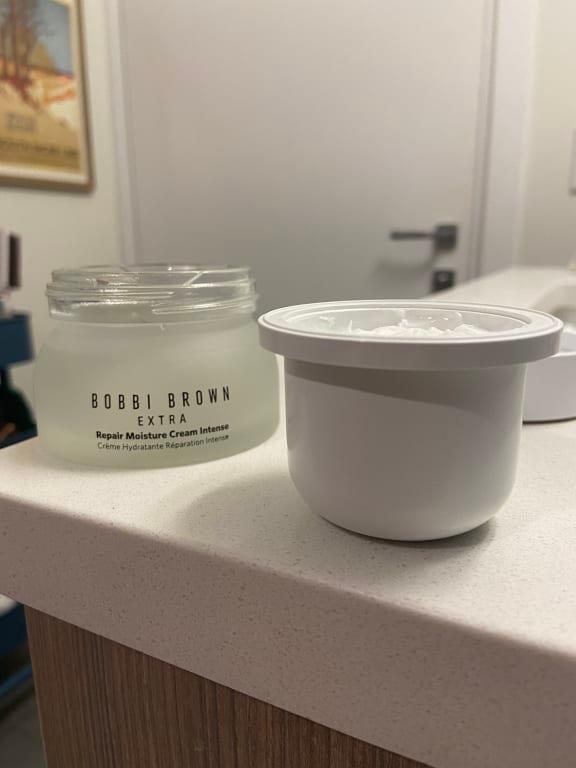 The refillable pot of product within the jar container