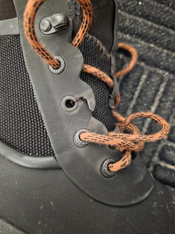 Metal eyelet fell out and then boot material tore