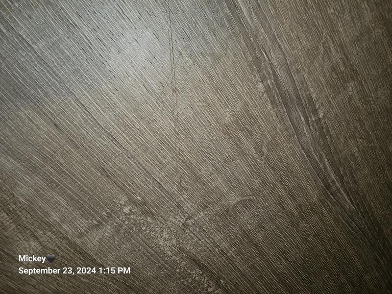 Newly scratched floor from bona cleaner