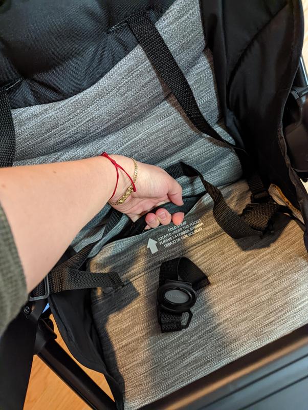 one handed collapse mechanism tucked under flap for safety