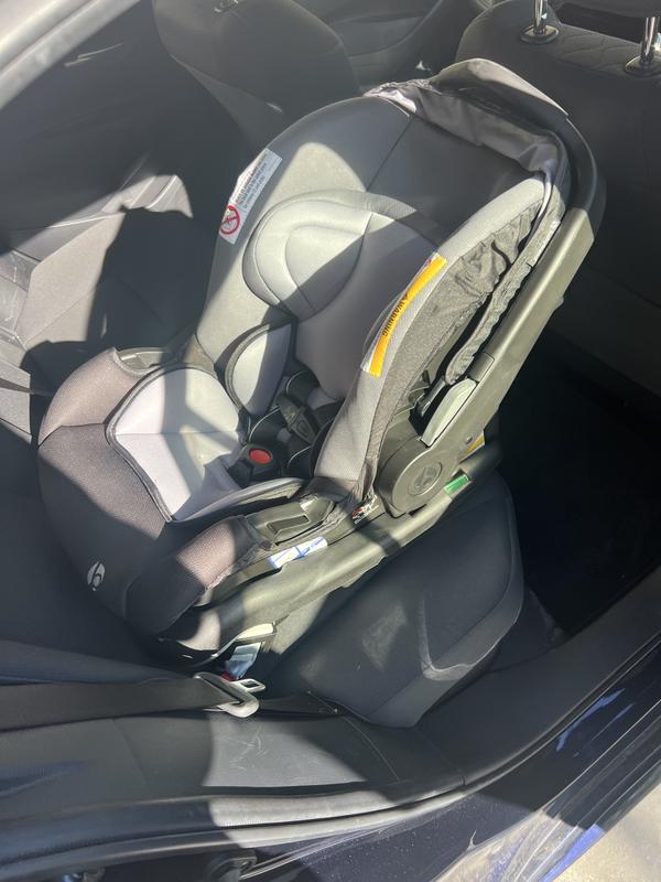 Car seat base with car seat attached