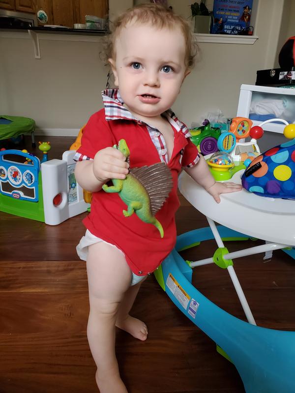 My son holding on, while practicing to stand.