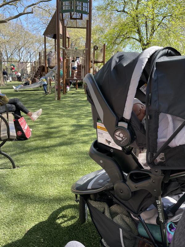 Watching big brother and sister at the playground