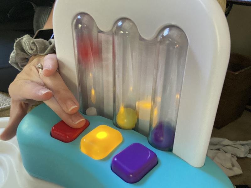 The toy that lights up with balls and sounds. It can be a bit loud.