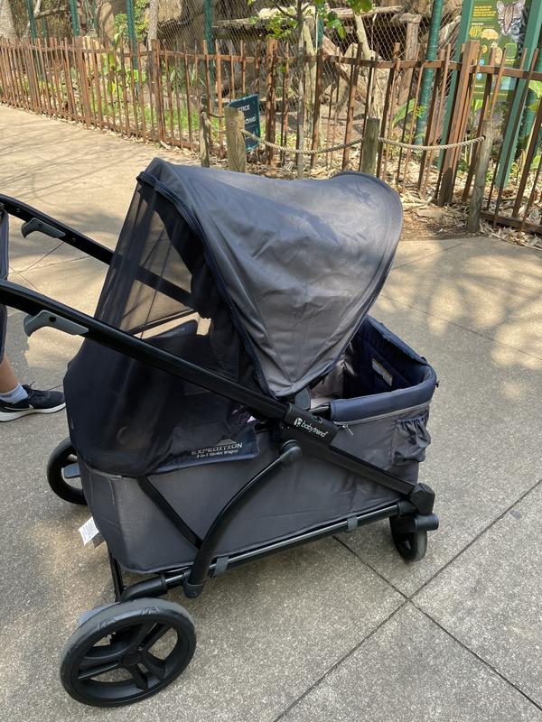 1 baby stroller, 2 fishing poles, 2 coolers.