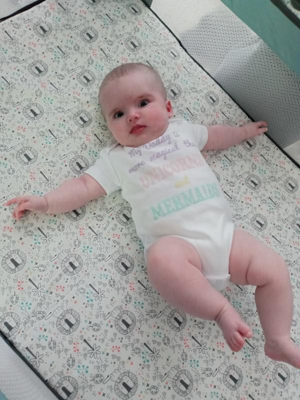 Enjoying her bassinet.