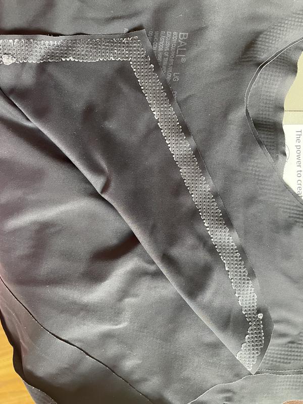 back of bra,  glued seam is coming apart